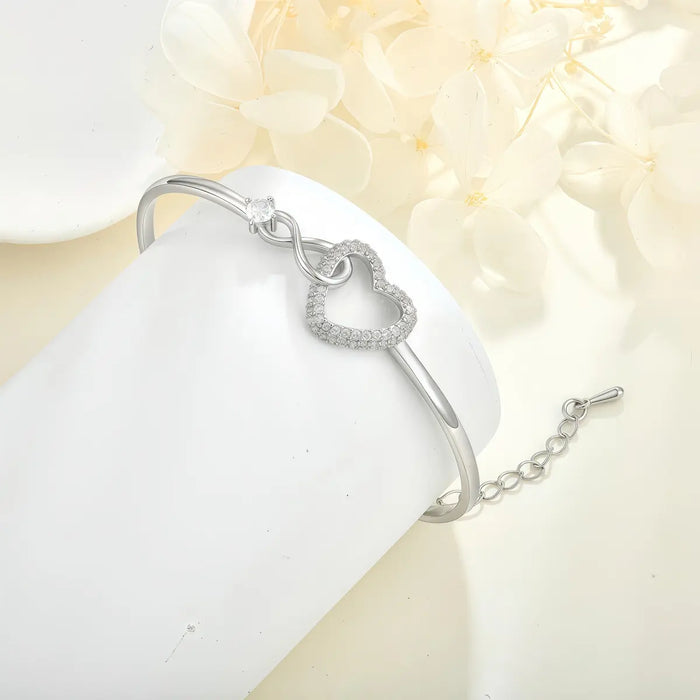 PULSERA CORAZÓN PARA MUJER PLATEADA AJUSTABLE ESTILO CARTIER (GENÉRICA) GRADO B
