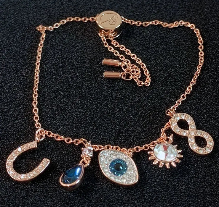 PULSERA TIPO SWAROVSKI PULSERA DAZZLING SWAN 17.3CM ORO ROSA  |   GRADO B