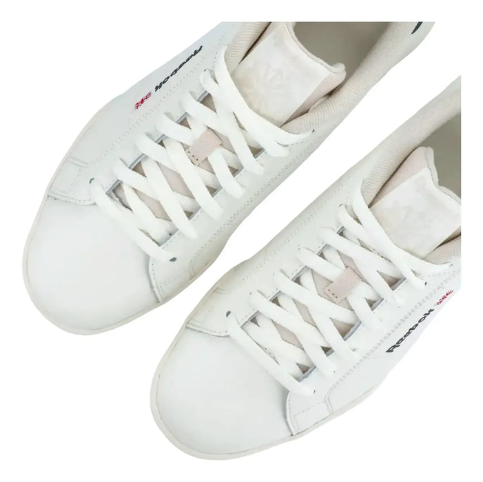TENIS REEBOK NPC II UNISEX ADULTO BLANCO LISA 28 MX GRADO B