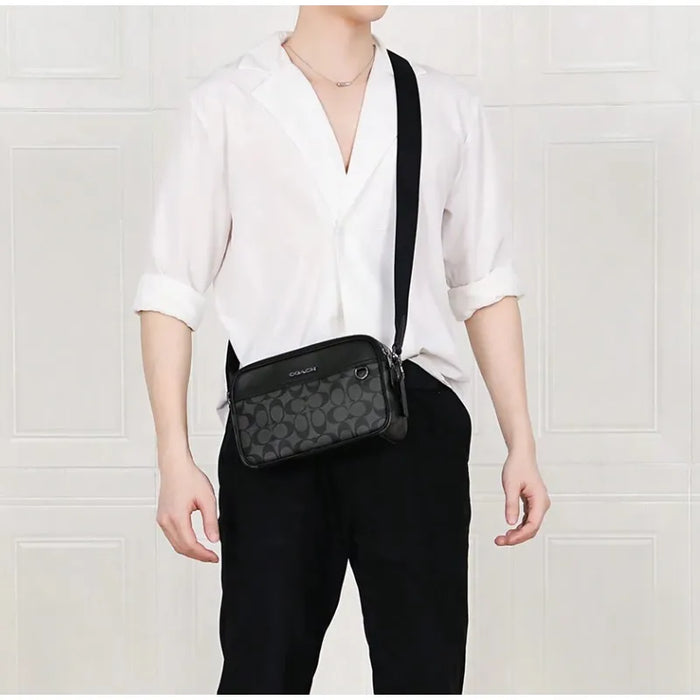 Bolsa Hombre Graham Crossbody Signature Canvas Grado B
