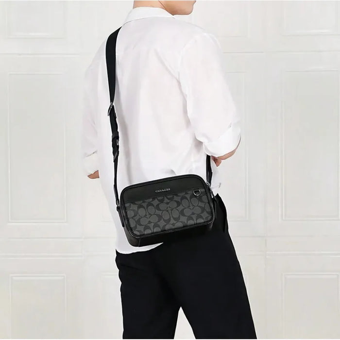Bolsa Hombre Graham Crossbody Signature Canvas Grado B