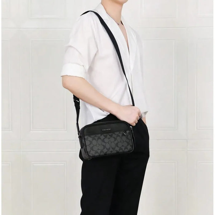 Bolsa Hombre Graham Crossbody Signature Canvas Grado B